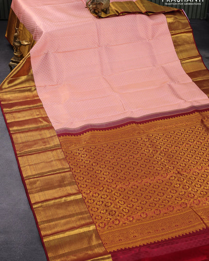 Pure kanjivaram silk saree mild peach orange and maroon with allover zari woven brocade weaves and long rich zari woven border
