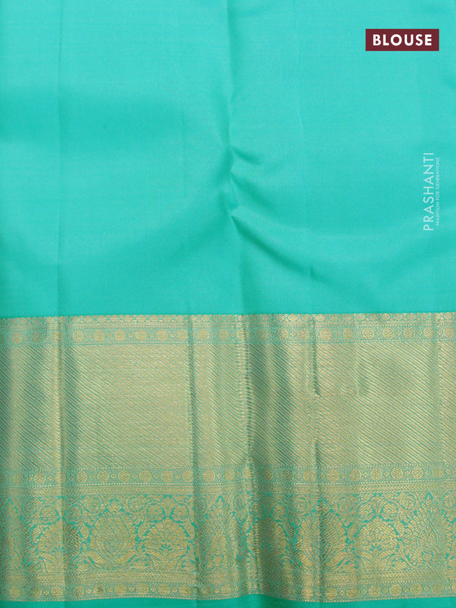 Pure kanjivaram silk saree dark pink and teal green shade with allover zari checks & butta weaves and long zari woven border