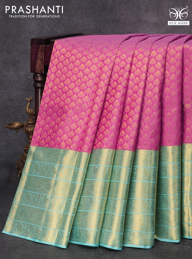 Pure kanjivaram silk saree pink and teal blue with allover zari woven brocade weaves and long rich zari woven border