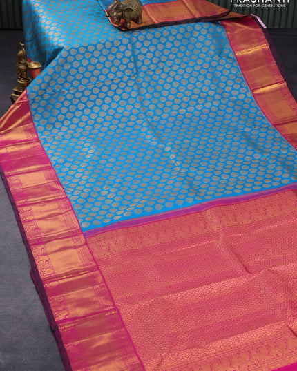 Pure kanjivaram silk saree cs blue and pink with allover zari woven butta weaves and long zari woven border