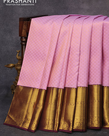 Pure kanjivaram silk saree light pink and wine shade with allover zari woven brocade weaves and rich zari woven border