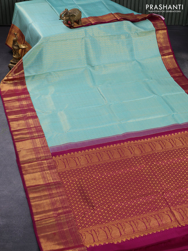 Pure kanjivaram silk saree teal blue and purple with allover zari woven brocade weaves and rich zari woven border