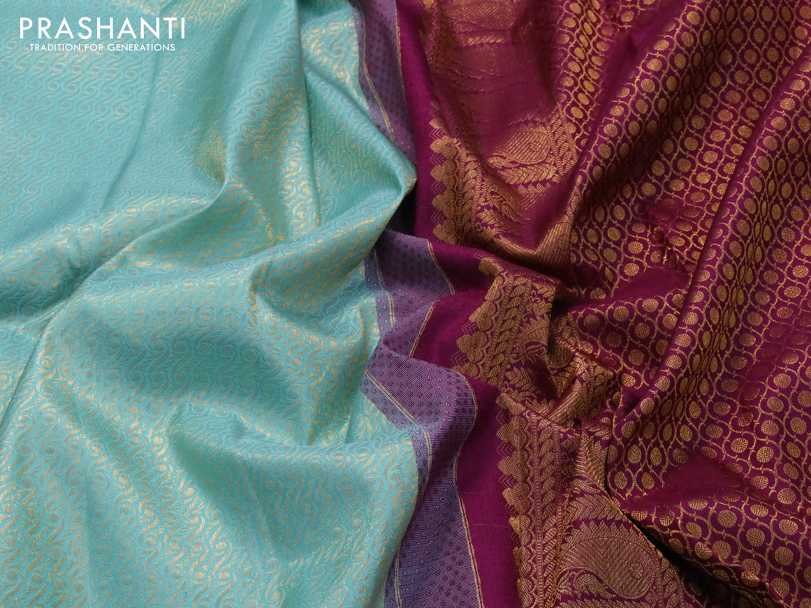 Pure kanjivaram silk saree teal blue and purple with allover zari woven brocade weaves and rich zari woven border