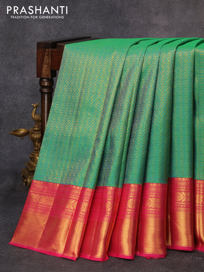 Pure kanjivaram silk saree dual shade of green and pink with allover zari woven brocade weaves and rich zari woven border