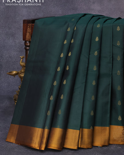 Pure kanjivaram silk saree bottle green and dark mustard with zari woven buttas and zari woven annam butta border