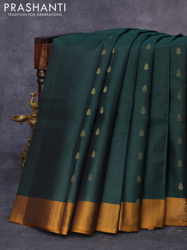 Pure kanjivaram silk saree bottle green and dark mustard with zari woven buttas and zari woven annam butta border