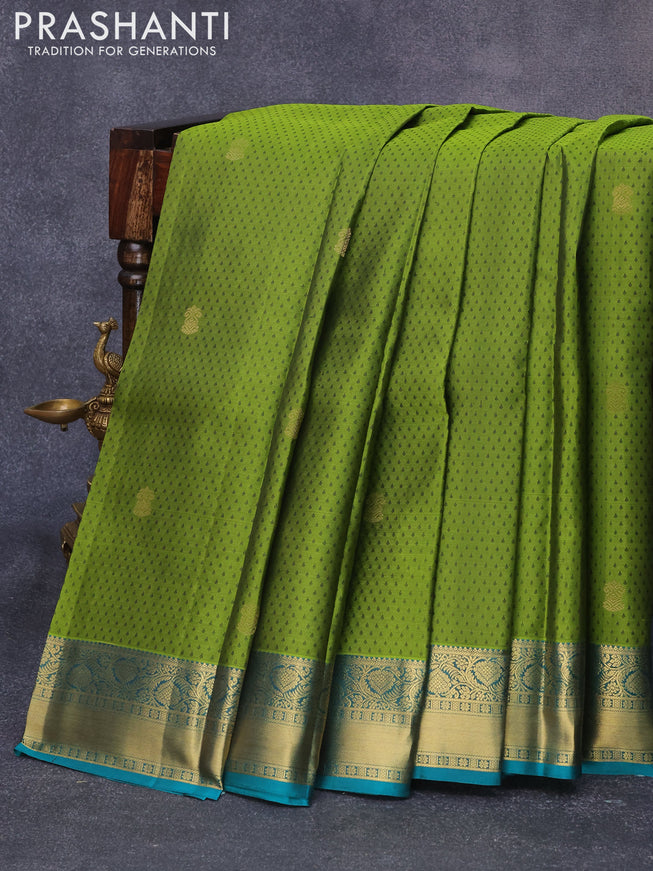 Pure kanjivaram silk saree mehendi green and peacock green with allover self emboss & zari buttas and floral zari woven border