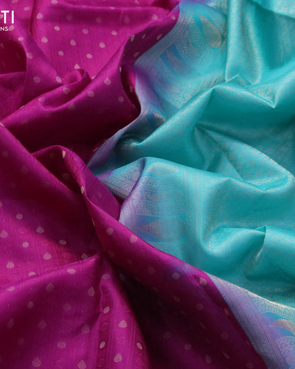 Pure kanjivaram silk saree purple and teal blue with allover self emboss & zari buttas and copper zari woven border