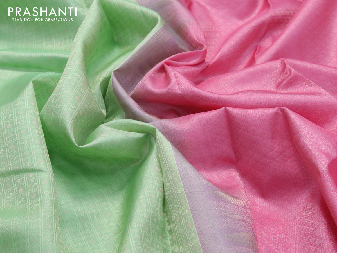 Pure kanjivaram silk saree pastel green and pink with allover self emboss & zari buttas and copper zari woven border