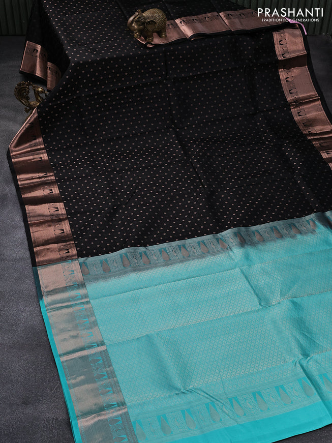 Pure kanjivaram silk saree black and teal blue with allover self emboss & zari buttas and copper zari woven border