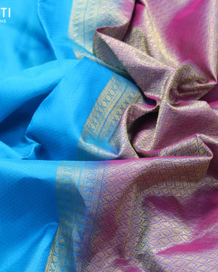 Pure kanjivaram silk saree cs blue and dual shade of purple with allover self emboss and rich rudhraksha zari woven border