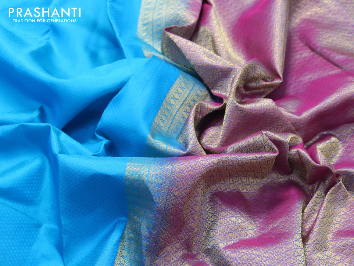Pure kanjivaram silk saree cs blue and dual shade of purple with allover self emboss and rich rudhraksha zari woven border