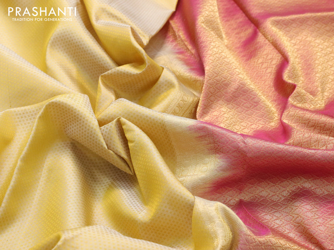 Pure kanjivaram silk saree dual shade of pale yellow and dual shade of pink with allover self emboss and rich rudhraksha zari woven border