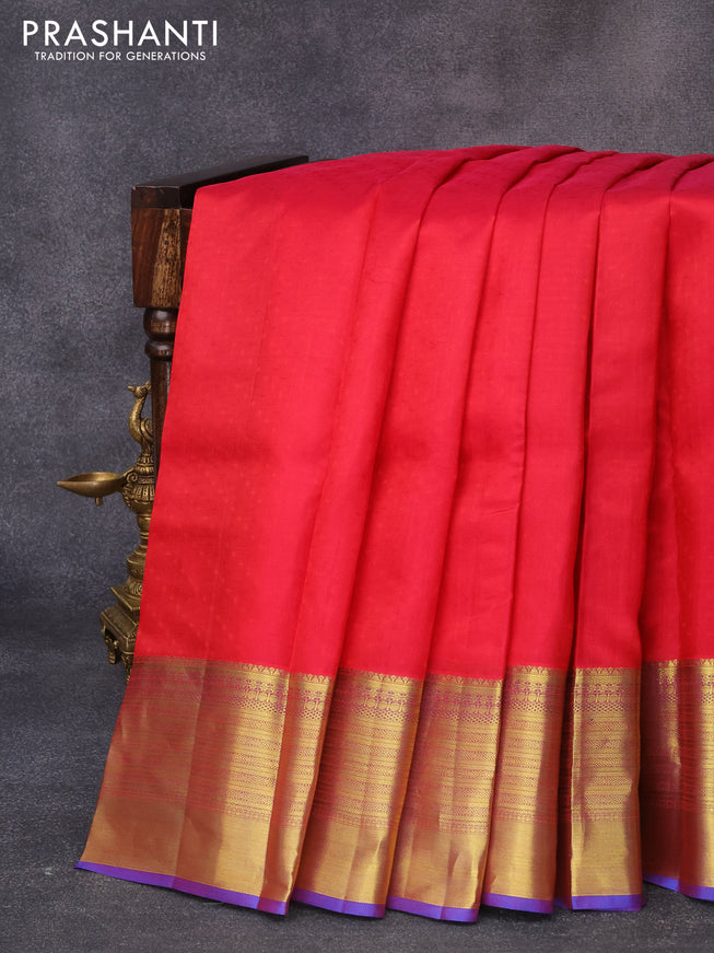 Pure kanjivaram silk saree reddish pink and dual shade of reddish blue with allover self emboss and rich zari woven border