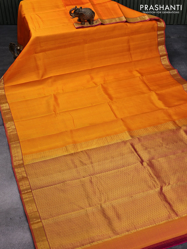 Pure kanjivaram silk saree dual shade of yellowish orange and dual shade of pink with allover self emboss and rudhraksha zari woven border
