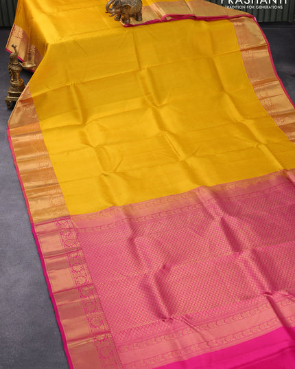 Pure kanjivaram silk saree mango yellow and pink with allover self emboss and floral zari woven border