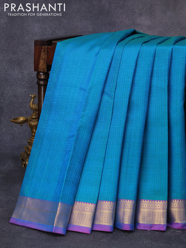 Pure kanjivaram silk saree dual shade of greenish blue and dual shade of bluish pink with allover self emboss and zari woven border