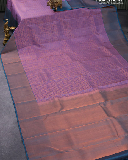 Pure kanjivaram silk saree purple shade and peacock blue with allover copper zari weaves and copper zari woven border