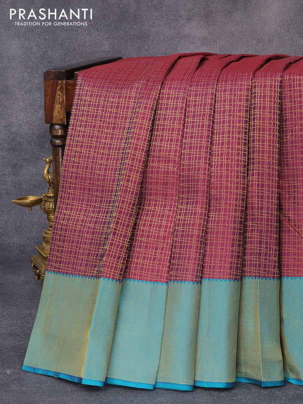 Pure kanjivaram silk saree dual shade of maroon and teal green with allover zari weaves and zari woven border