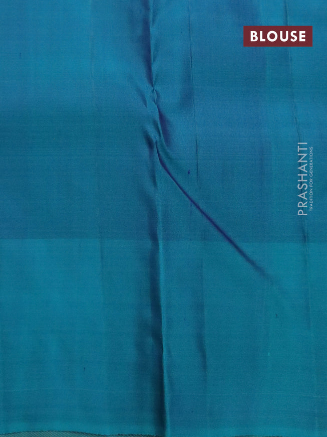 Pure kanjivaram silk saree dual shade of maroon and teal green with allover zari weaves and zari woven border