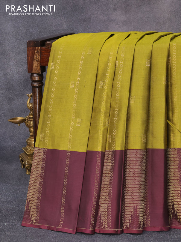 Pure kanjivaram silk saree mehendi green and deep maroon with allover zari weaves & buttas and zari woven temple border