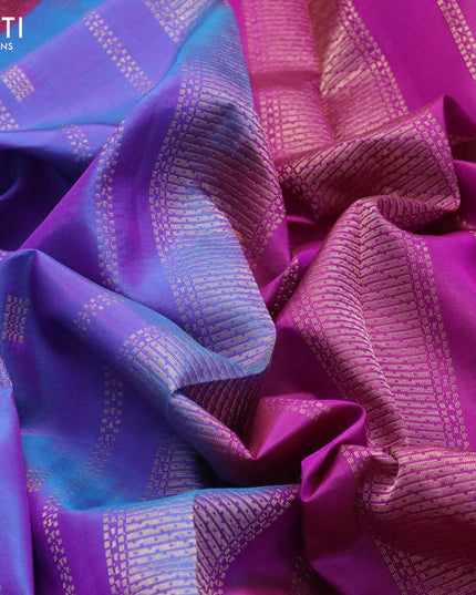 Pure kanjivaram silk saree dual shade of bluish purple and purple with allover zari weaves & buttas and zari woven temple border
