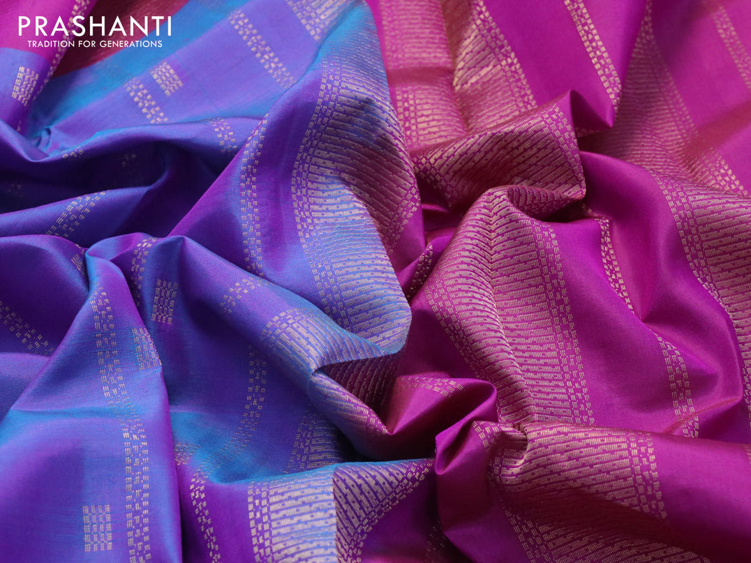 Pure kanjivaram silk saree dual shade of bluish purple and purple with allover zari weaves & buttas and zari woven temple border