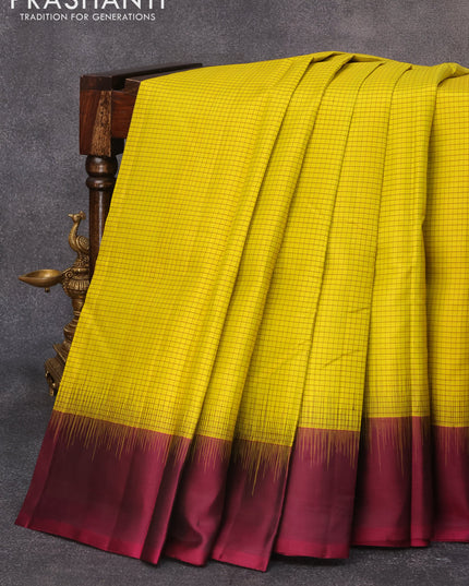 Pure kanjivaram silk saree yellow and wine shade with allover zari checks pattern and simple border