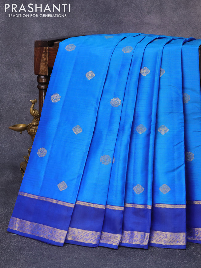 Pure kanjivaram silk saree dual shade of blue and royal blue with zari woven buttas and rettapet zari woven border