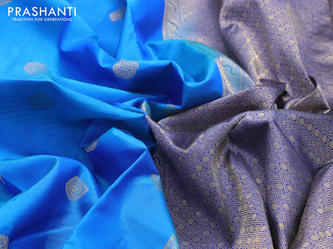 Pure kanjivaram silk saree dual shade of blue and royal blue with zari woven buttas and rettapet zari woven border
