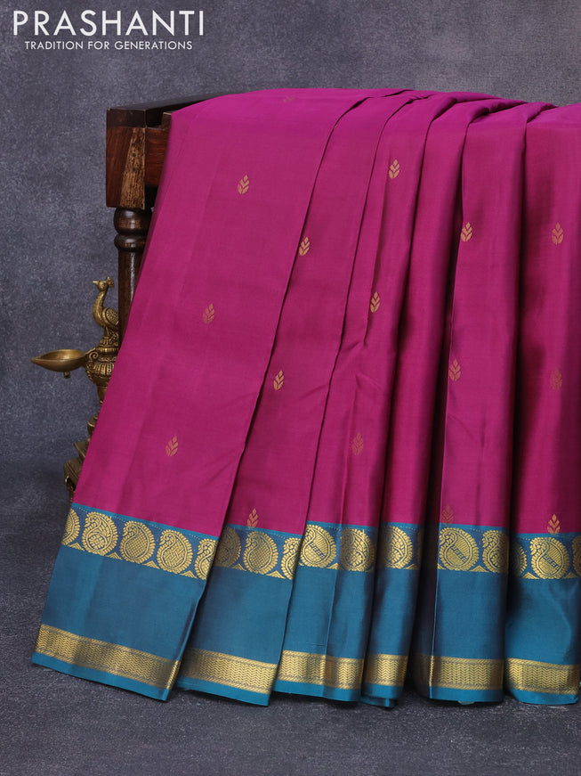 Pure kanjivaram silk saree dark magenta pink and peacock green shade with zari woven buttas and rettapet zari woven border