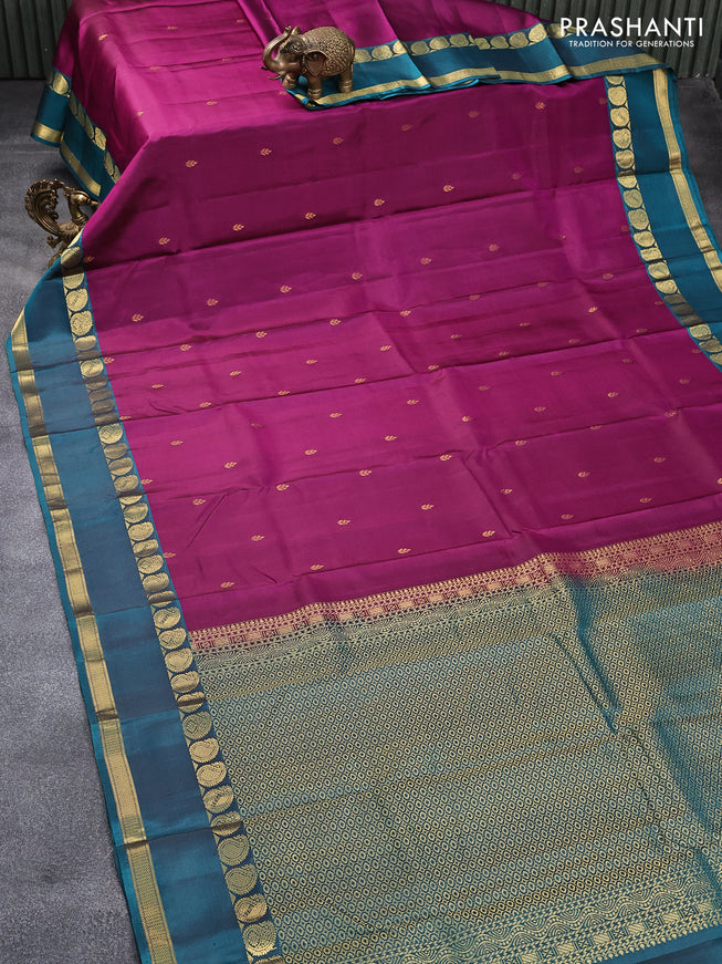 Pure kanjivaram silk saree dark magenta pink and peacock green shade with zari woven buttas and rettapet zari woven border