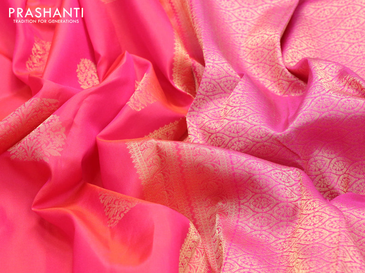 Pure kanjivaram silk saree dual shade of pinkish orange and pink with zari woven floral buttas and rich zari woven border