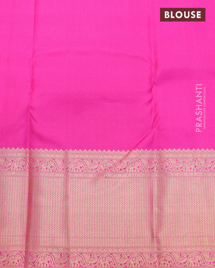 Pure kanjivaram silk saree dual shade of pinkish orange and pink with zari woven floral buttas and rich zari woven border