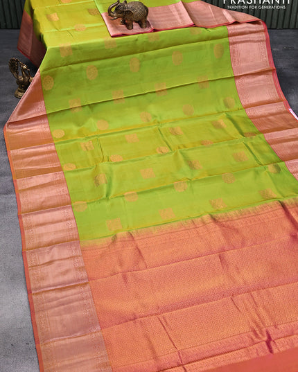Pure kanjivaram silk saree dual shade of light green and dual shade of pink with copper zari woven buttas and rich copper zari woven border
