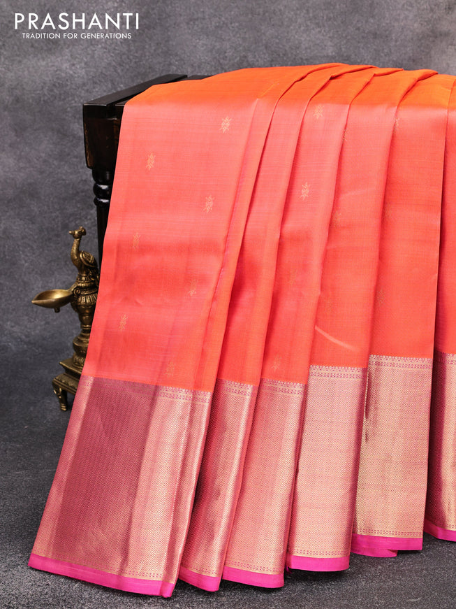 Pure kanjivaram silk saree dual shade of peach orange and dual shade of pink with zari woven buttas and long zari woven border
