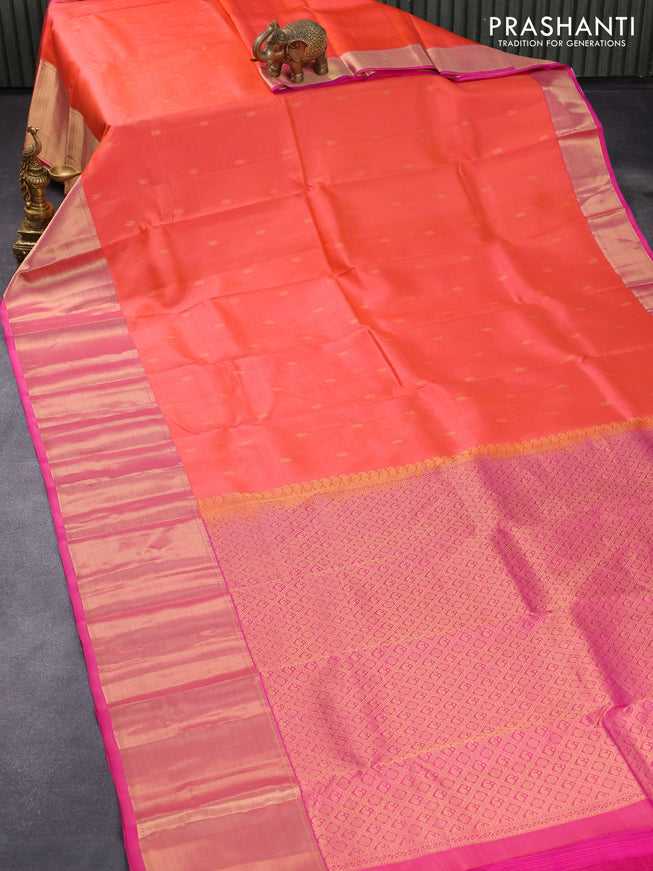 Pure kanjivaram silk saree dual shade of peach orange and dual shade of pink with zari woven buttas and long zari woven border