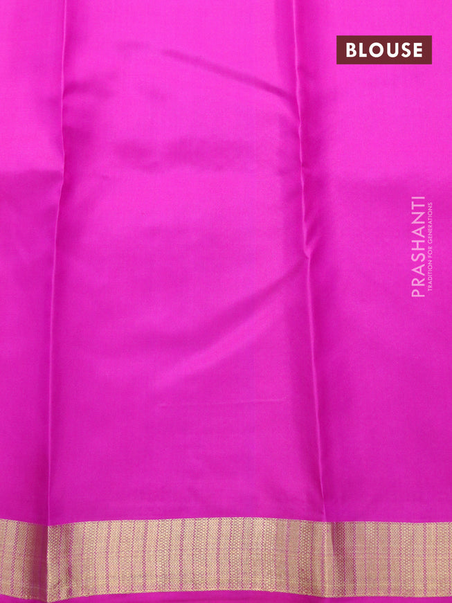 Pure kanjivaram silk saree dual shade of pinkish orange and pink with allover zari buttas and zari woven border