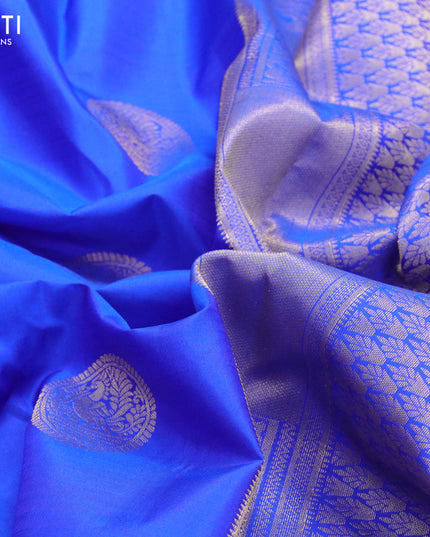 Pure kanjivaram silk saree royal blue and dual shade of pinkish orange with annam zari woven buttas and long zari woven border
