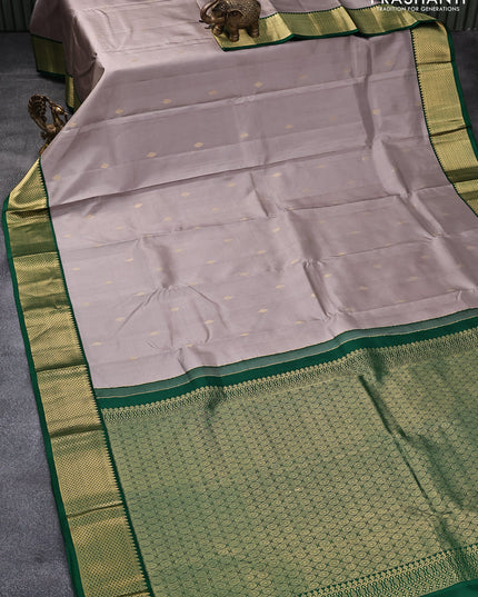 Pure kanjivaram silk saree grey shade and green with zari woven buttas and zari woven korvai border