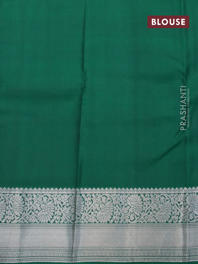 Pure kanjivaram silk saree purple and green with allover silver zari woven buttas and floral silver zari woven border