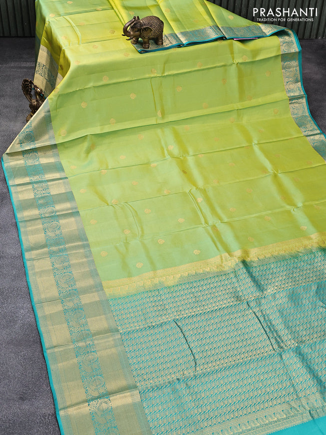 Pure kanjivaram silk saree dual shade of lime green and teal blue with zari woven buttas and long annam zari woven border