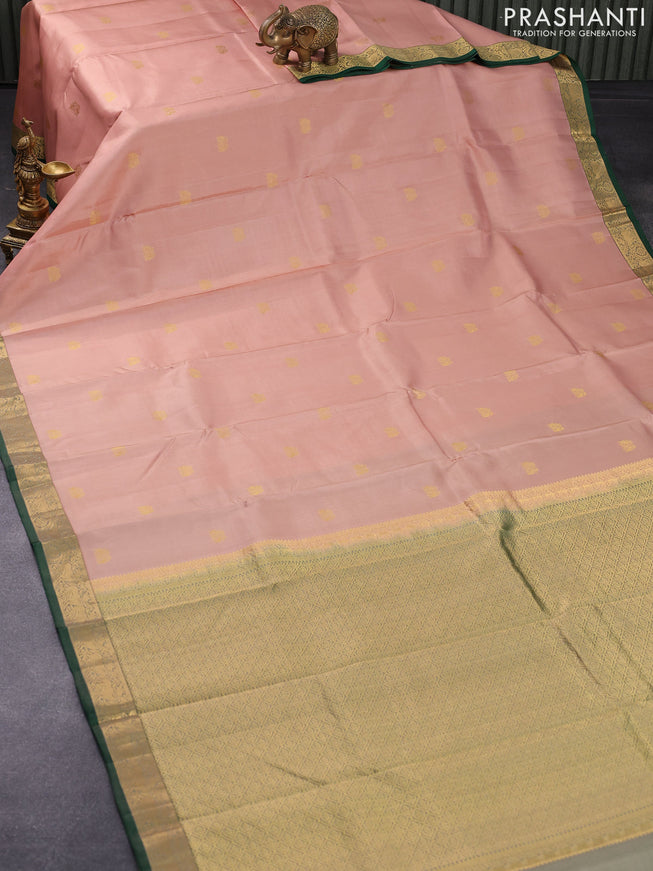 Pure kanjivaram silk saree pastel peach shade and green with zari woven buttas and rich zari woven border