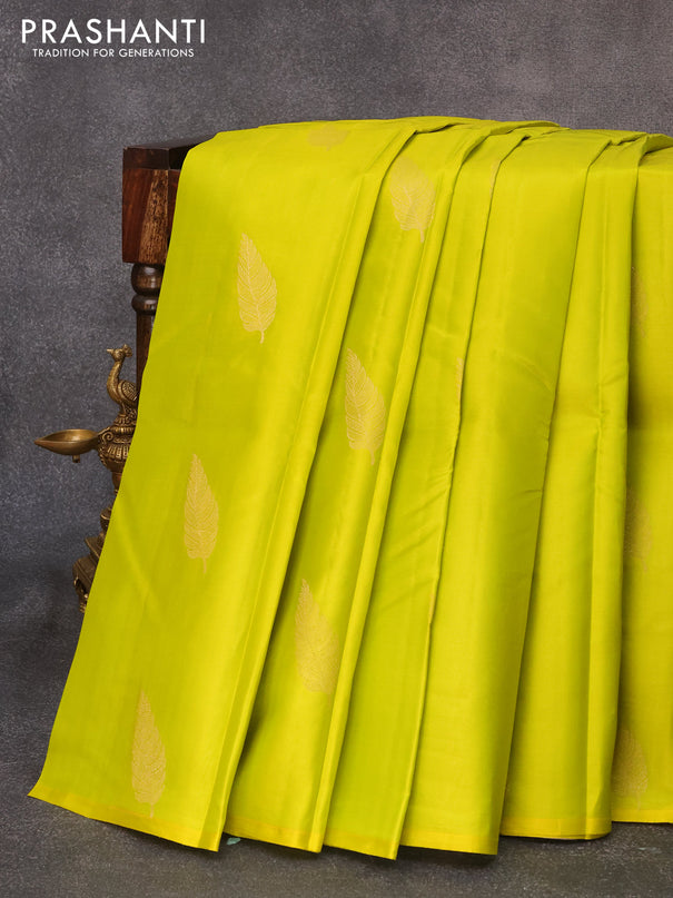 Pure kanjivaram silk saree lime yellow and cream with leaf zari woven buttas in borderless style