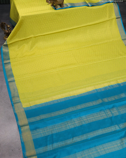 Pure mysore silk saree lime yellow and teal blue with allover geometric weaves and zari woven border