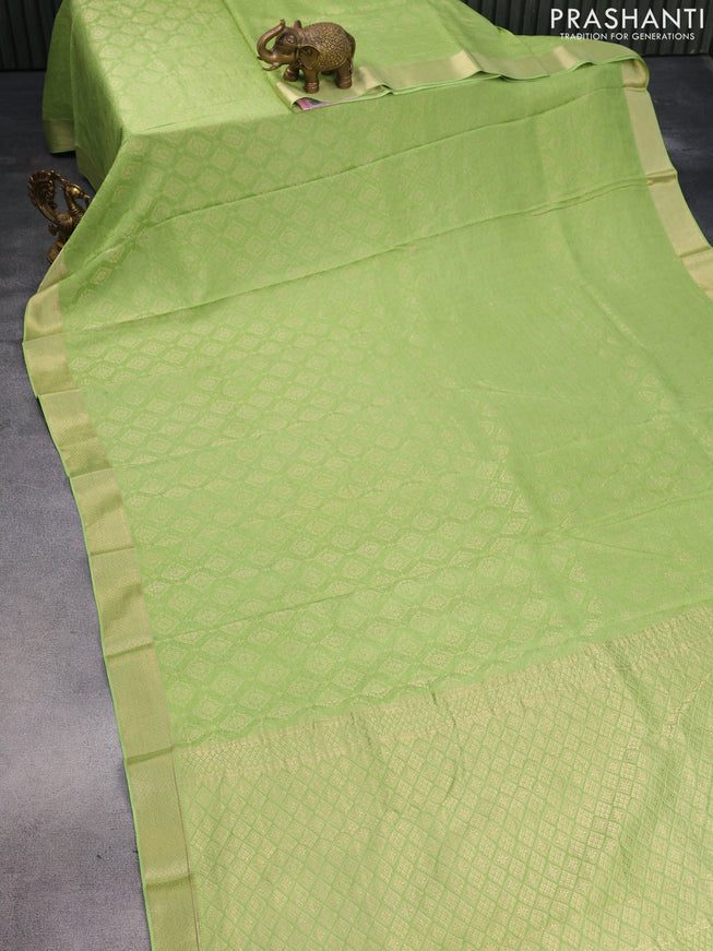 Pure mysore silk saree light green with allover zari woven brocade weaves and zari woven border