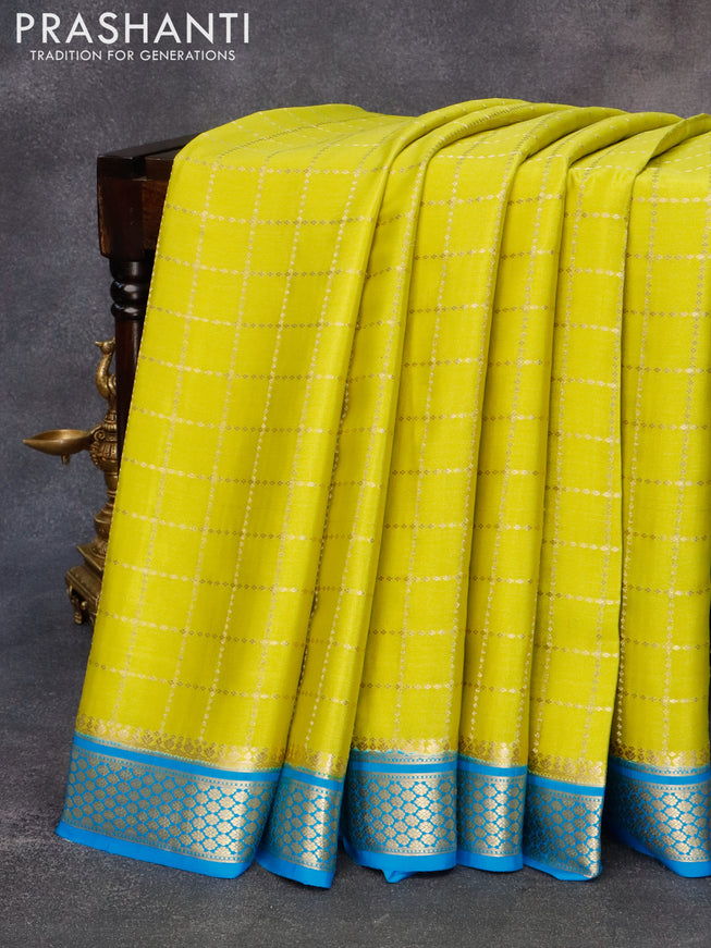 Pure mysore silk saree fluorescent green and cs blue with allover zari checked pattern and zari woven border