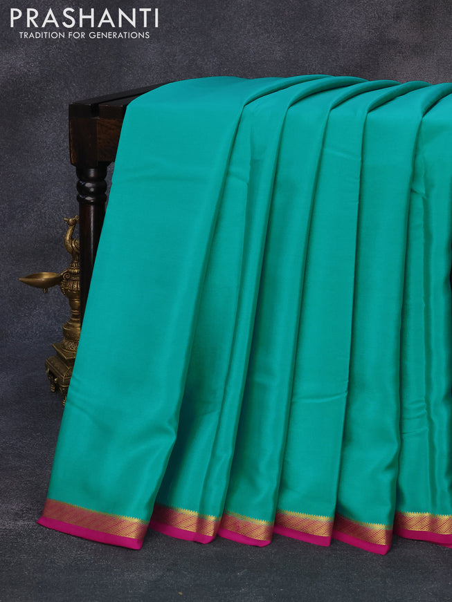 Pure mysore silk saree teal green and magenta pink with plain body and zari woven border