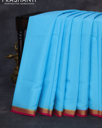 Pure mysore silk saree light blue and pink with plain body and zari woven border