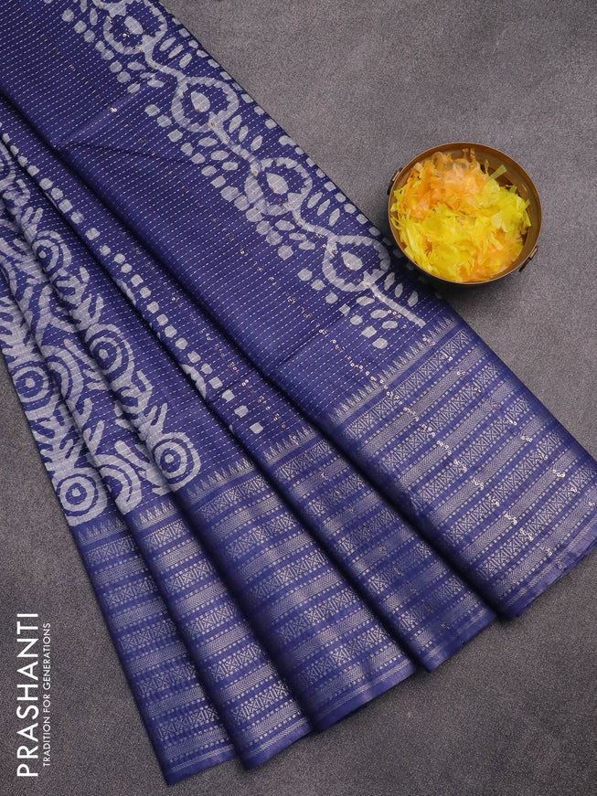 Semi tussar saree blue with allover batik prints and long silver zari woven border